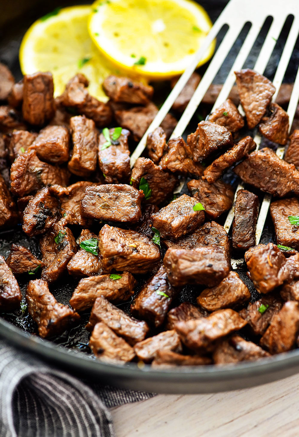 Lemon Garlic Steak Bites are tender and juicy pieces of steak packed with lemon and garlic flavors. Life-in-the-Lofthouse.com