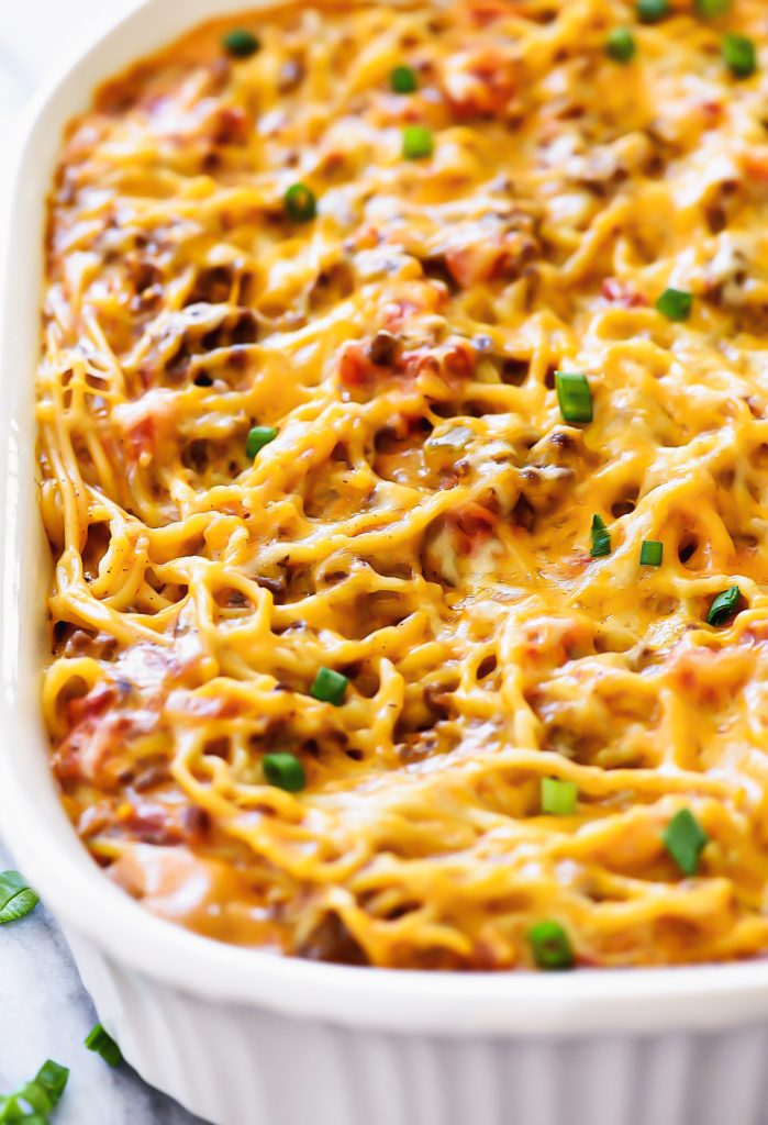 Taco Spaghetti is filled with ground beef, tomatoes, green chilies, taco seasonings and cheese with spaghetti noodles.