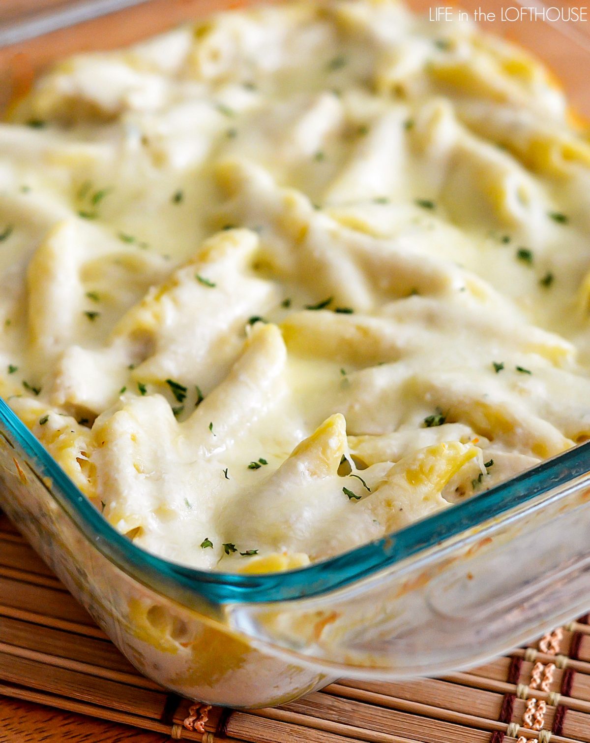 Three Cheese Chicken Alfredo Bake is cheesy, creamy heaven with Ricotta, Parmesan and Mozzarella cheese. Life-in-the-Lofthouse.com