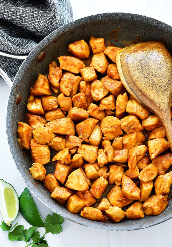 Chicken Taco Bites are tender pieces of chicken covered with taco seasoning, cilantro and lime. Life-in-the-Lofthouse.com