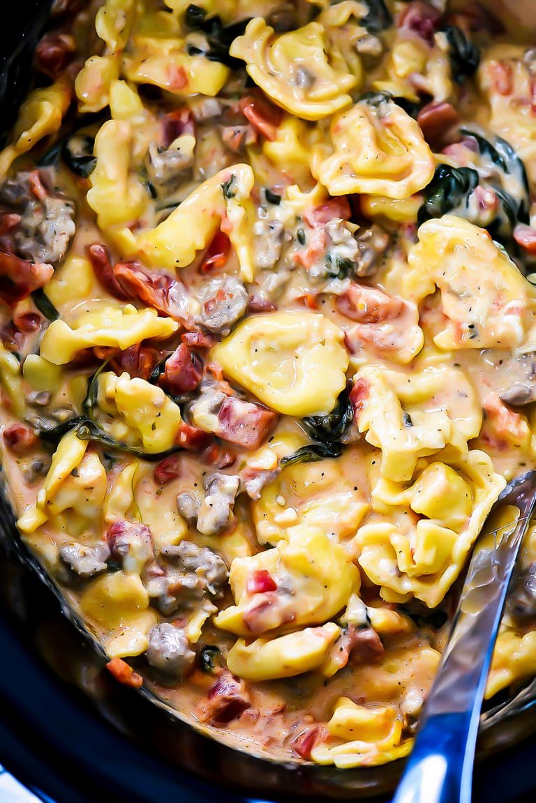 Sausage, cheese tortellini, spinach, diced tomatoes and cheese create this Slow Cooker Sausage and Cheese Tortellini. Life-in-the-Lofthouse.com
