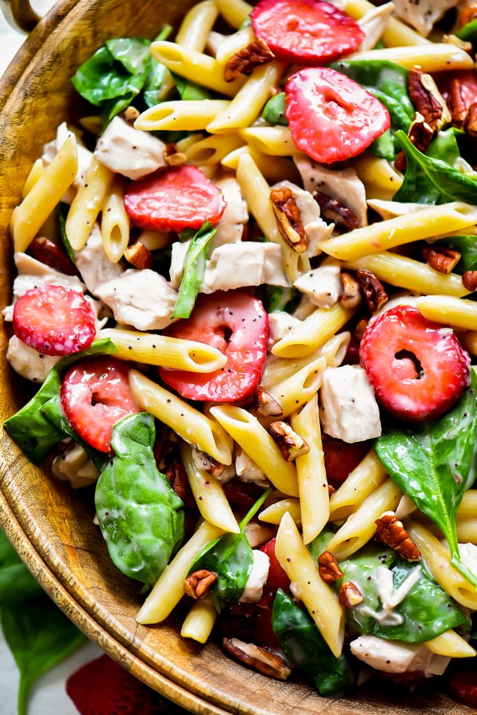 Strawberry Chicken and Spinach Pasta Salad is packed with flavor from grilled chicken, strawberries, spinach and poppy seed dressing. Life-in-the-Lofthouse.com