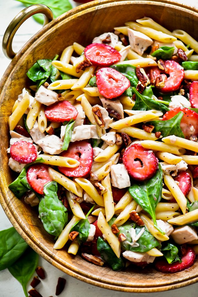 Strawberry Chicken and Spinach Pasta Salad is packed with flavor from grilled chicken, strawberries, spinach and poppy seed dressing. Life-in-the-Lofthouse.com