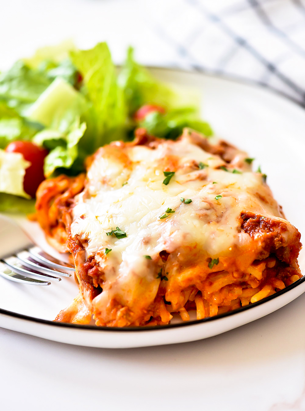 Baked Spaghetti is traditional spaghetti baked in the oven. Life-in-the-Lofthouse.com