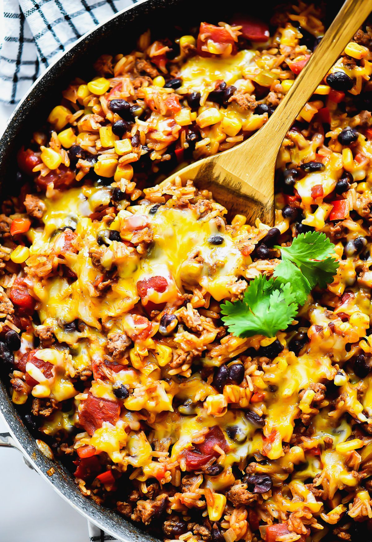 Beef Burrito Skillet is loaded with lean ground beef, jasmine rice, beans, cheese and more. Life-in-the-Lofthouse.com