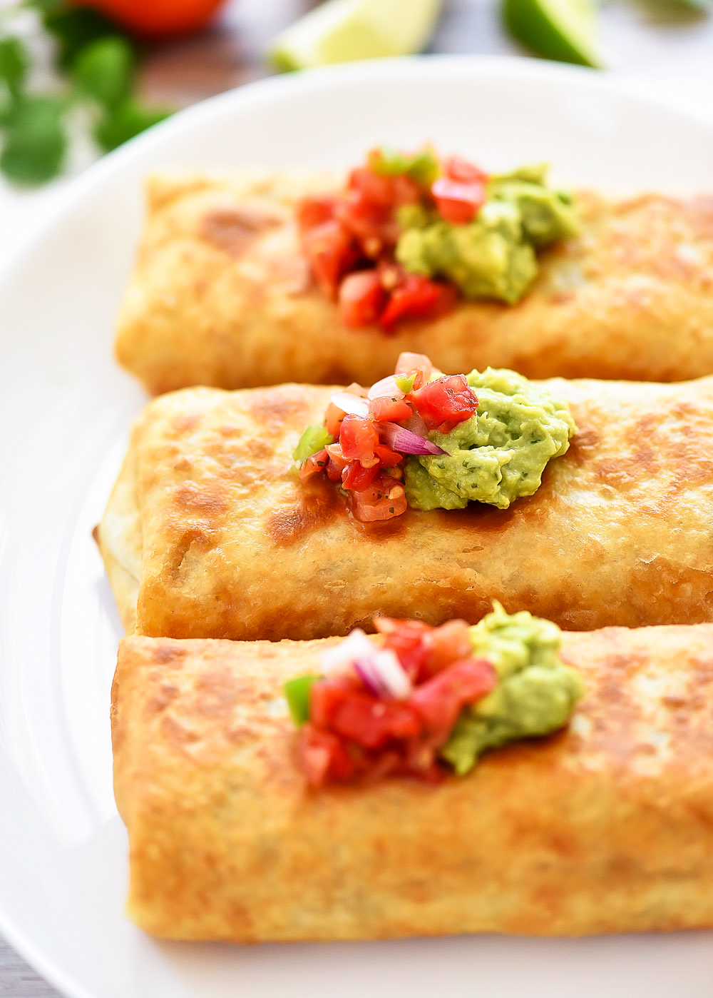 Chicken Chimichangas are filled with flavorful shredded chicken,&nbsp;Monterey jack cheese and diced green chilies. Life-in-the-Lofthouse.com