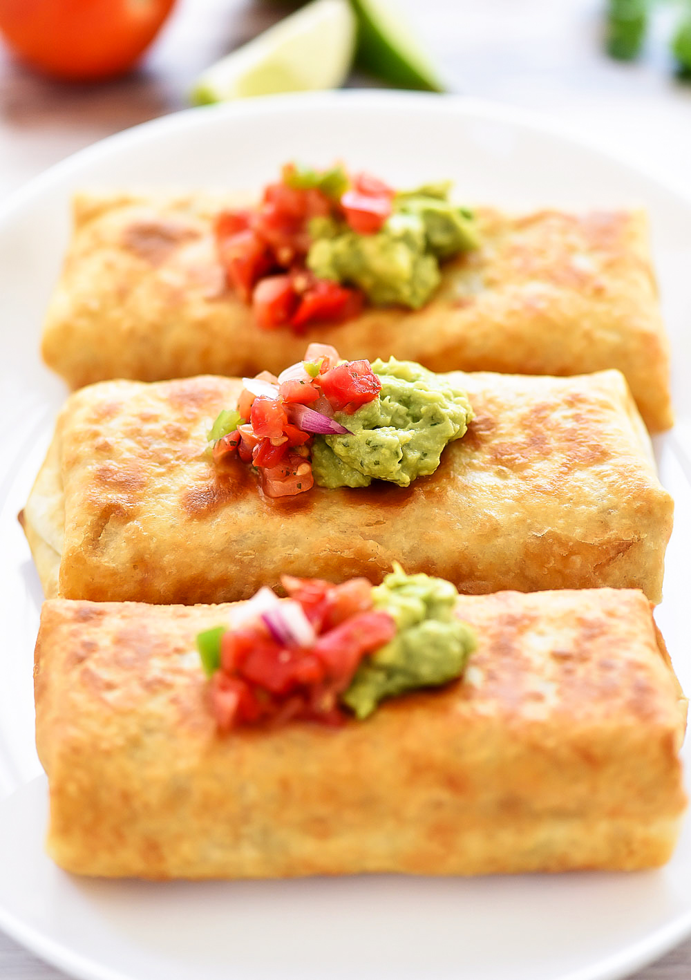 Chicken Chimichangas are filled with flavorful shredded chicken,&nbsp;Monterey jack cheese and diced green chilies. Life-in-the-Lofthouse.com