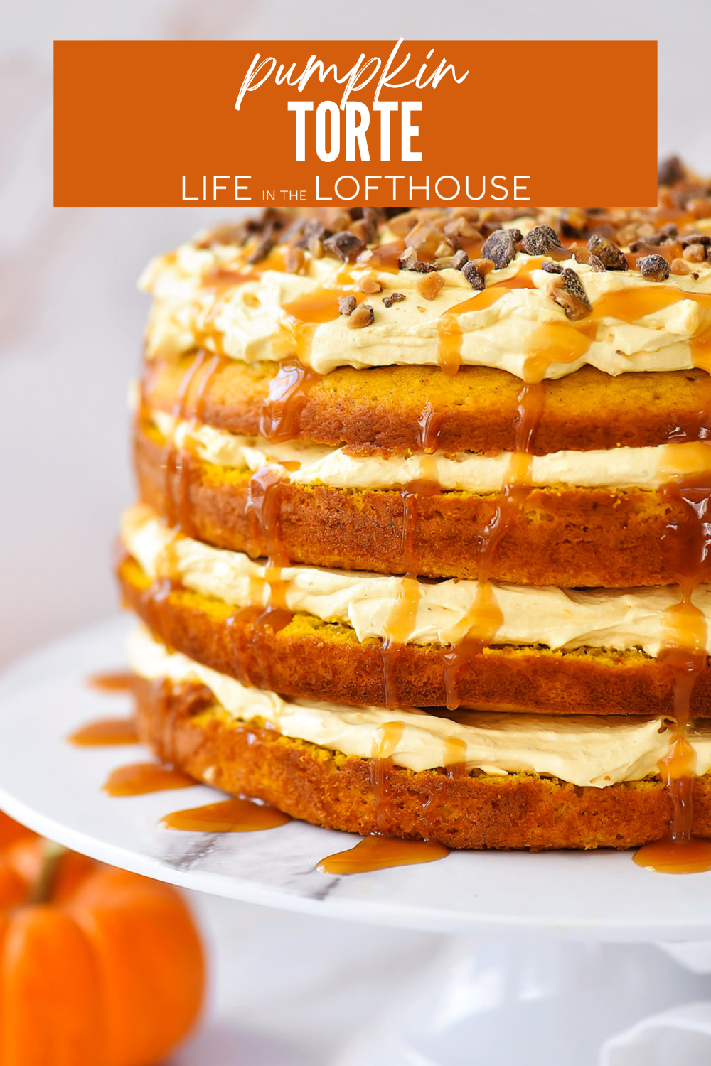 This Pumpkin Torte recipe contains layered spiced cake, creamy pumpkin filling, toffee bits & caramel drizzle. It's the perfect fall dessert for holidays & parties.