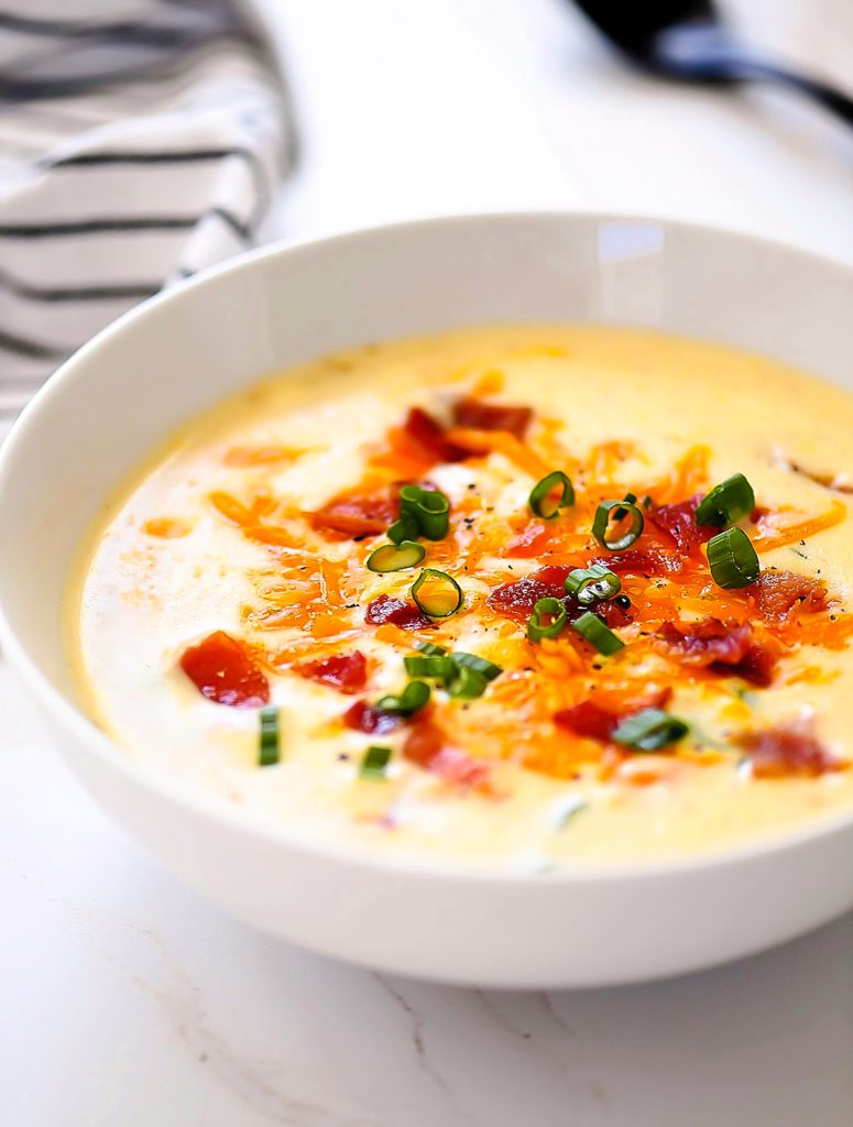 Creamy potato soup with bacon, cheese and green onions.