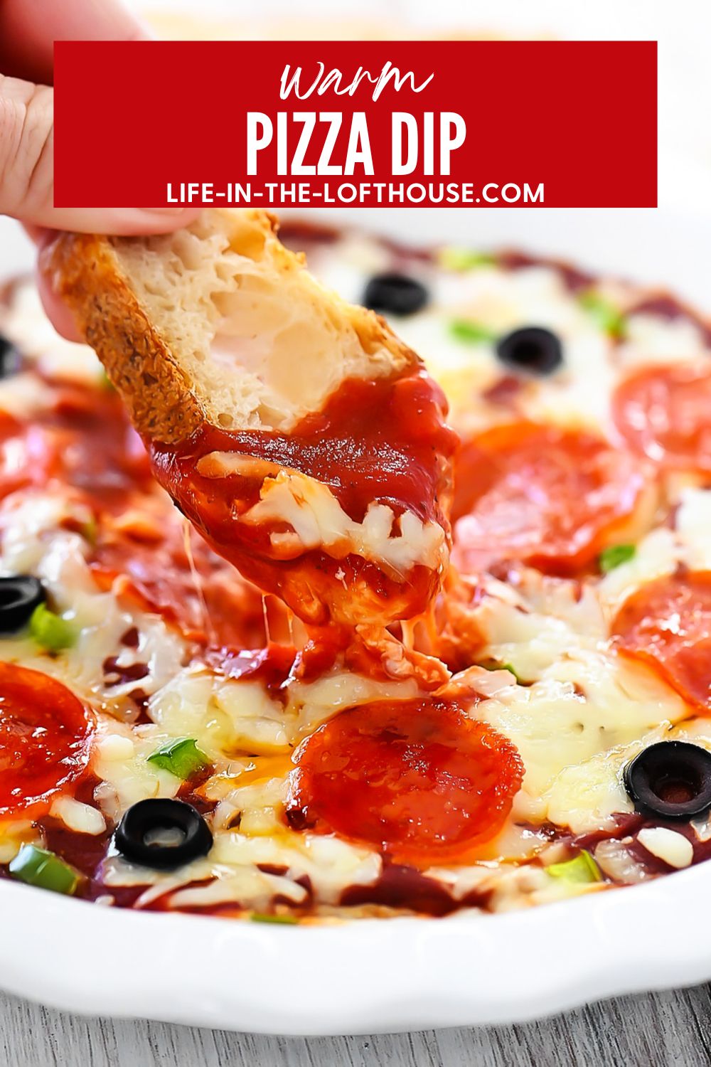 Warm Pizza Dip with two cheeses, pizza sauce and toppings.