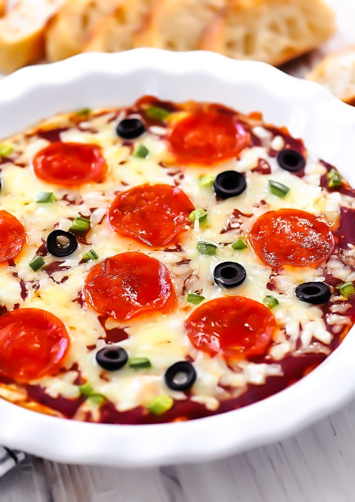 Warm Pizza Dip with two cheeses, pizza sauce and toppings.