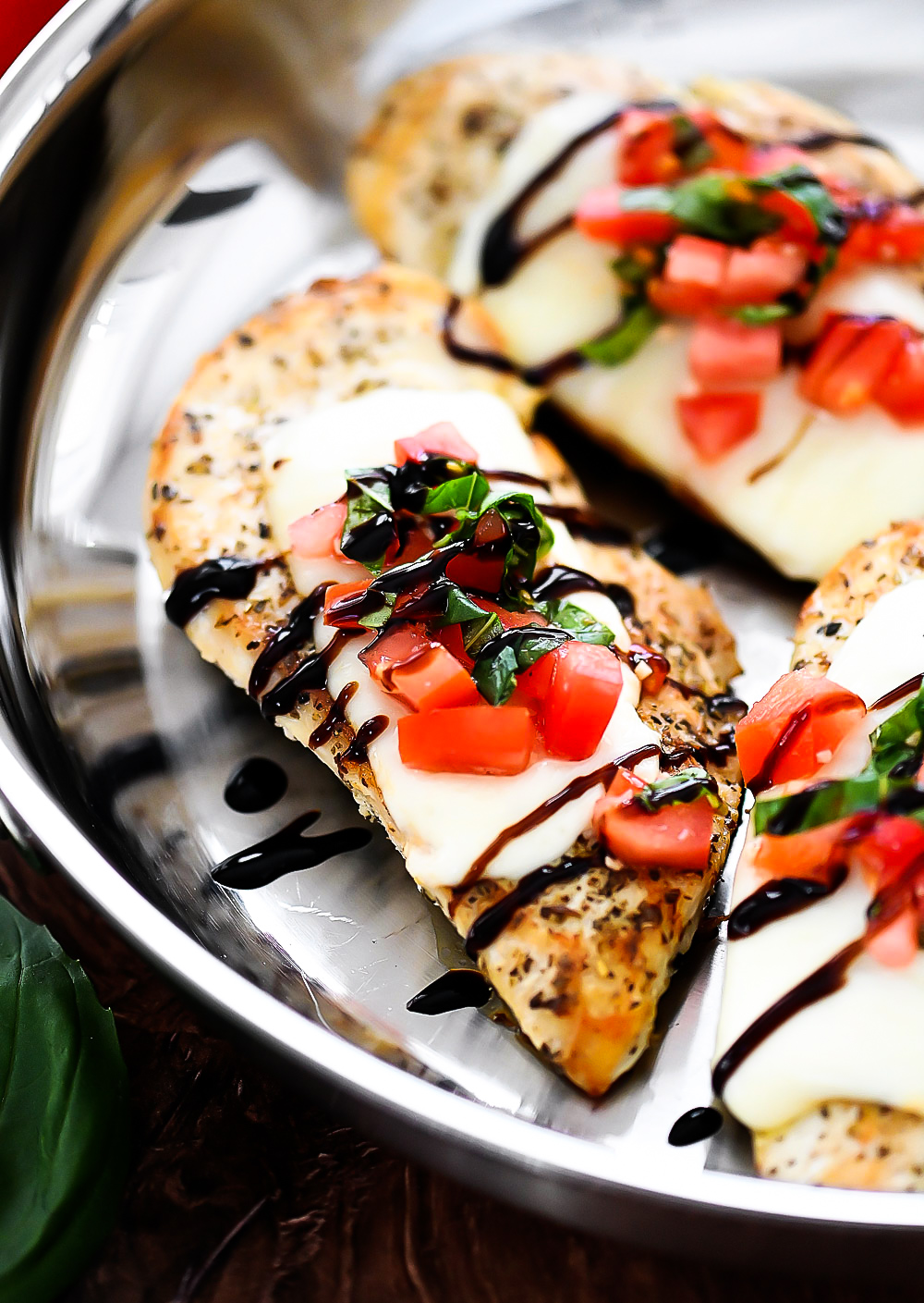 Seasoned chicken with bruschetta topping and Mozzarella cheese.