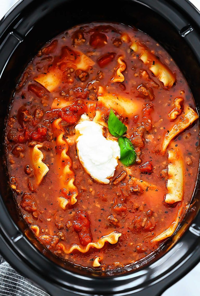Slow Cooker Lasagna Soup is a hearty fall pasta soup that is easy to make and will have everyone running to the dinner table!