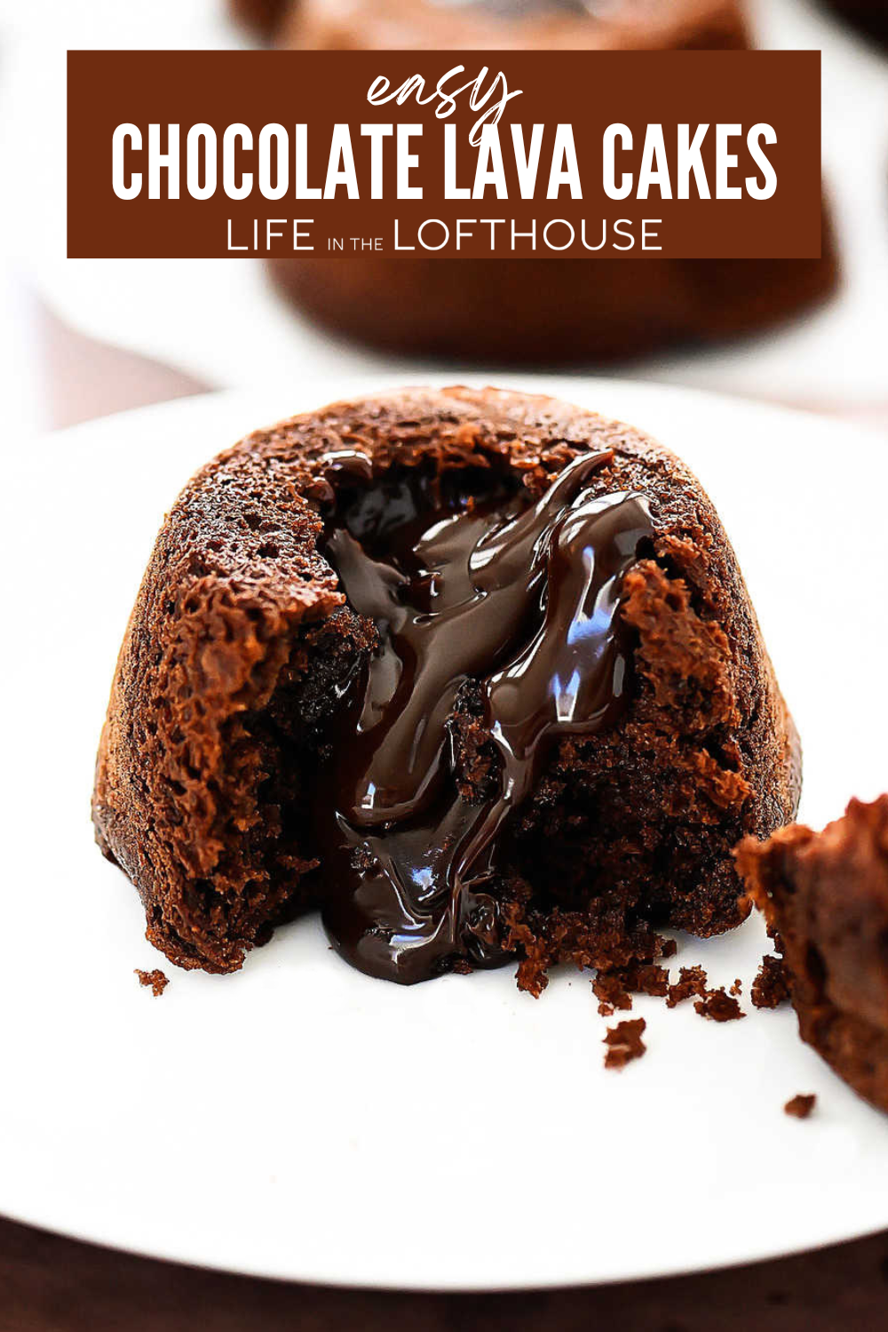 Easy Chocolate Lava Cakes with hot fudge in center on a white dish