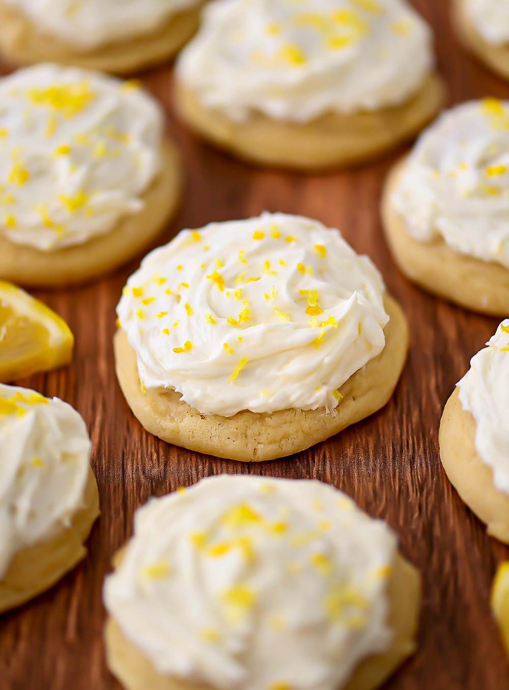 Lemon flavored sugar cookies with lemon buttercream frosting on top.