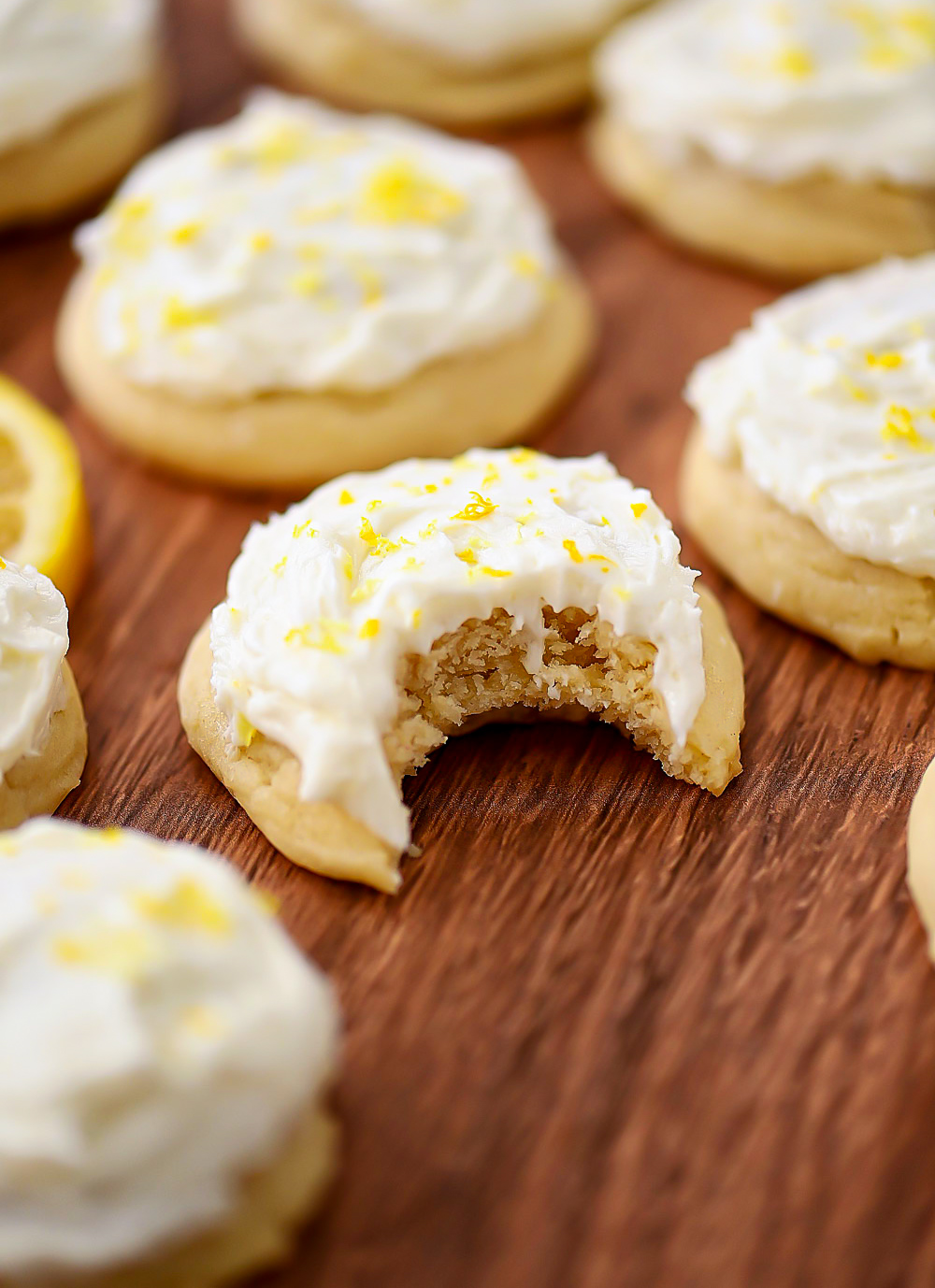Lemon flavored sugar cookies with lemon buttercream frosting on top.