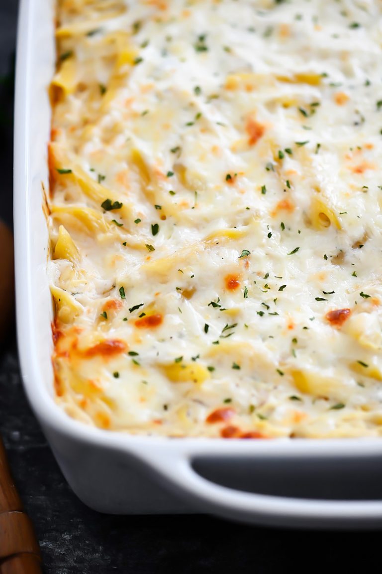Three Cheese Chicken Alfredo Bake is cheesy, creamy heaven with Ricotta, Parmesan and Mozzarella cheese. Life-in-the-Lofthouse.com