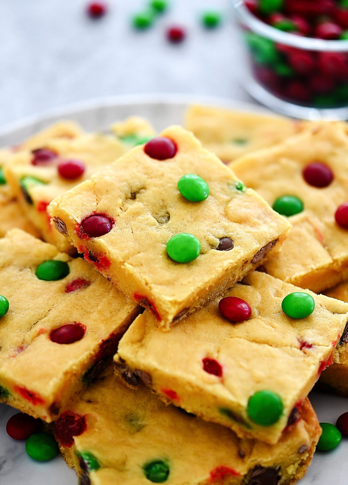 Cake Mix Cookie Bars&nbsp;are soft, chewy and loaded with chocolate chips and M&M's. Life-in-the-Lofthouse.com