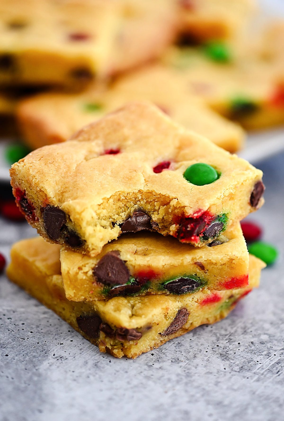Cake Mix Cookie Bars&nbsp;are soft, chewy and loaded with chocolate chips and M&M's. Life-in-the-Lofthouse.com