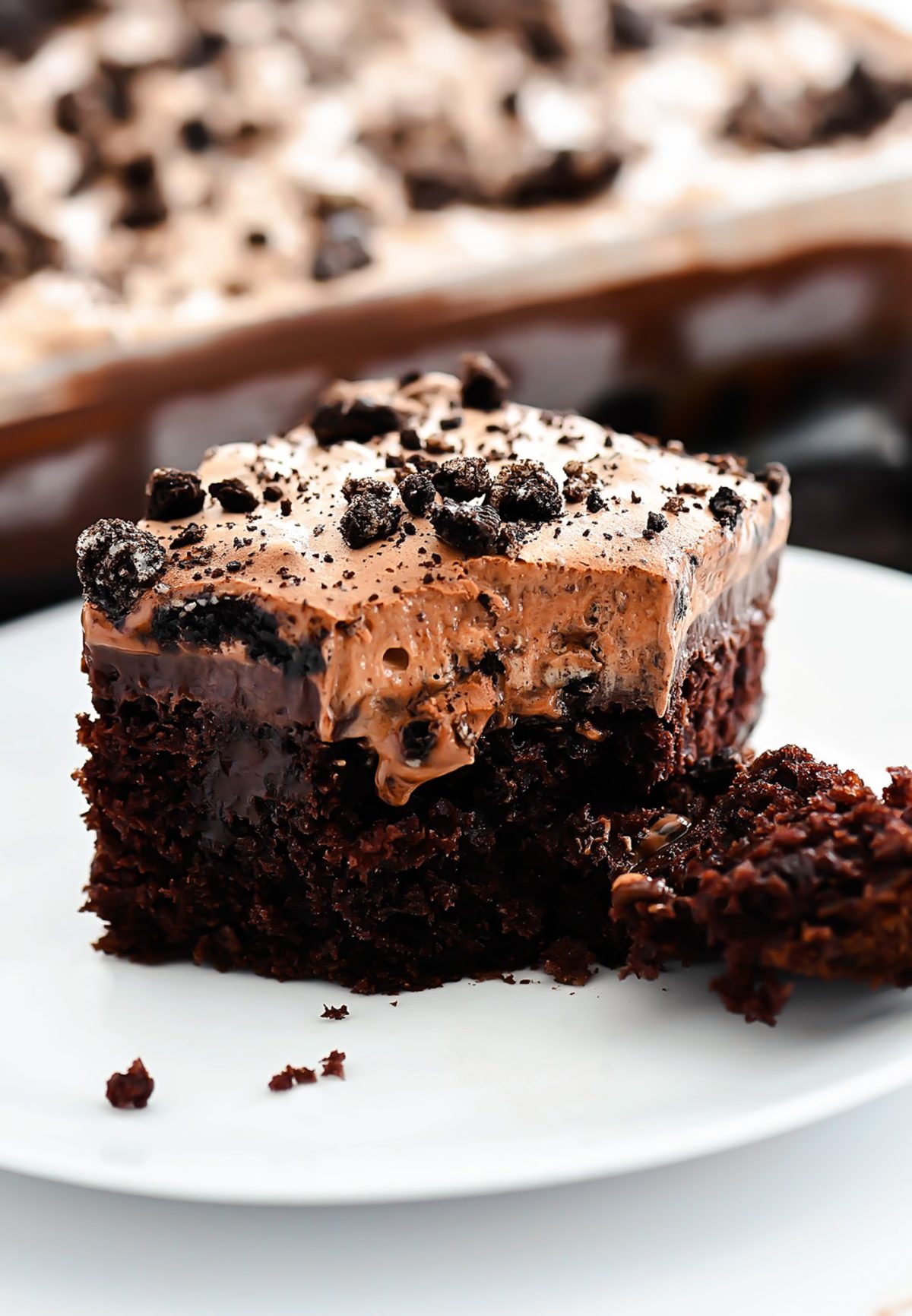 Oreo Hot Fudge Poke Cake