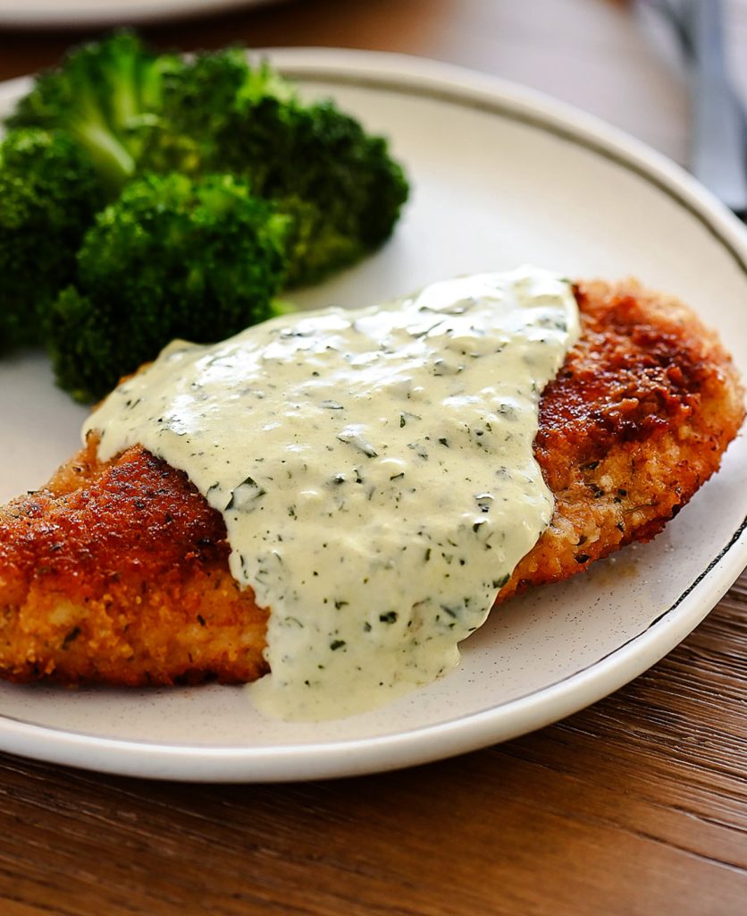 Chicken smothered in Basil Cream Sauce