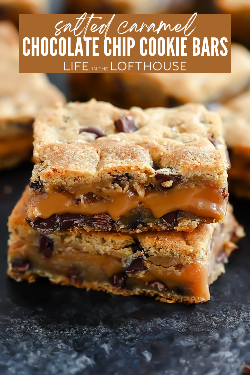 Salted Caramel Chocolate Chip Cookie Bars are a sweet and salty treat with two cookie layers with rich and salted caramel in the middle.