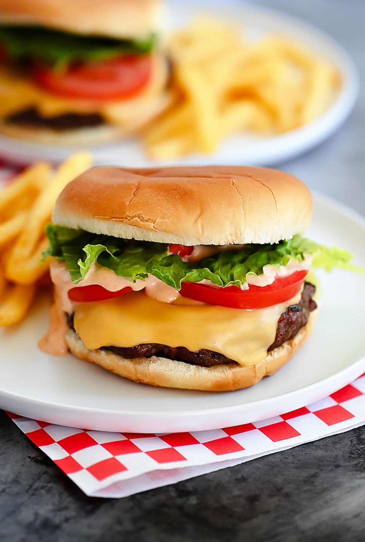 Juicy and flavorful cheeseburgers fresh off the grill that are smothered in a delicious "secret sauce". Life-in-the-Lofthouse.com