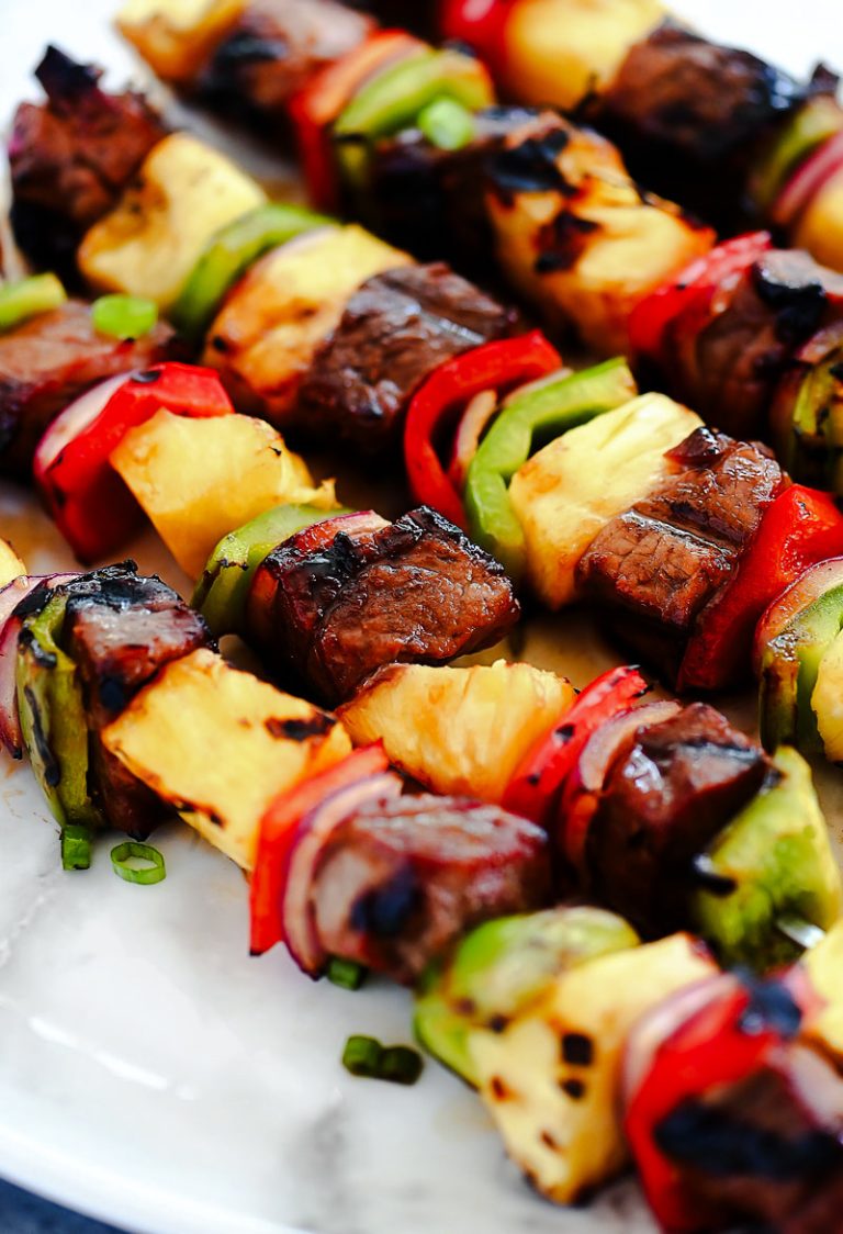 Steak skewers with bell pepper, pineapple and red onion.