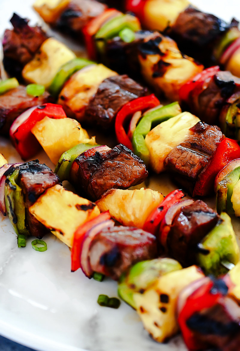 Steak skewers with bell pepper, pineapple and red onion.
