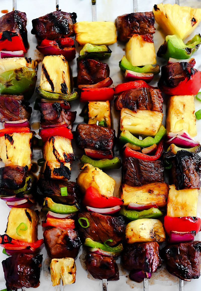 Steak skewers with bell pepper, pineapple and red onion.