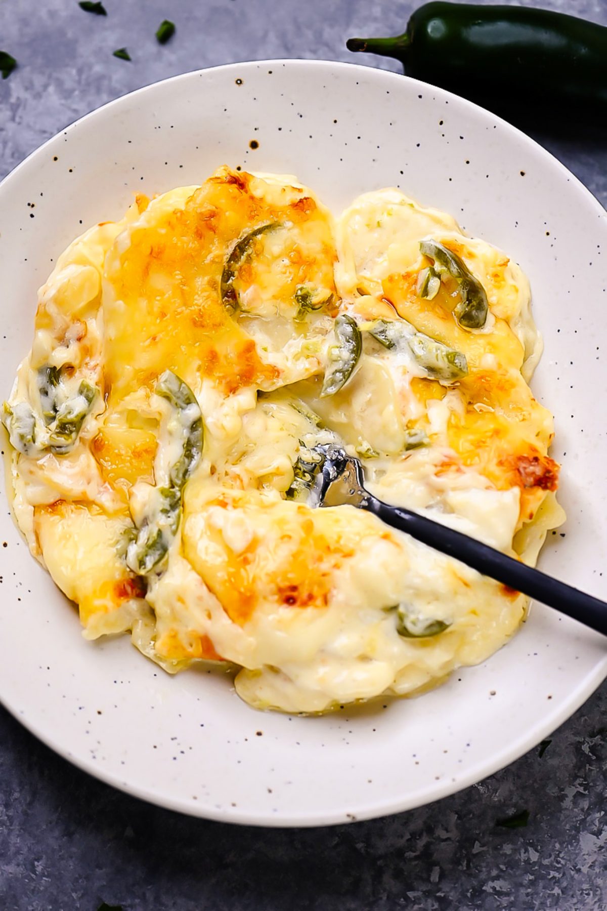 Cheesy and creamy jalape&ntilde;o potatoes.