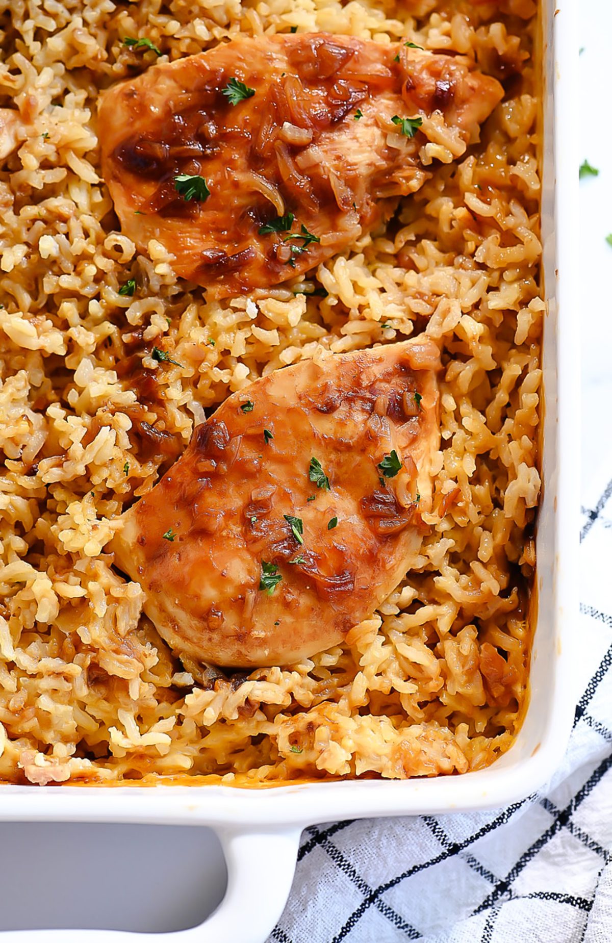 Seasoned chicken and fluffy rice bake together for one incredible dinner.