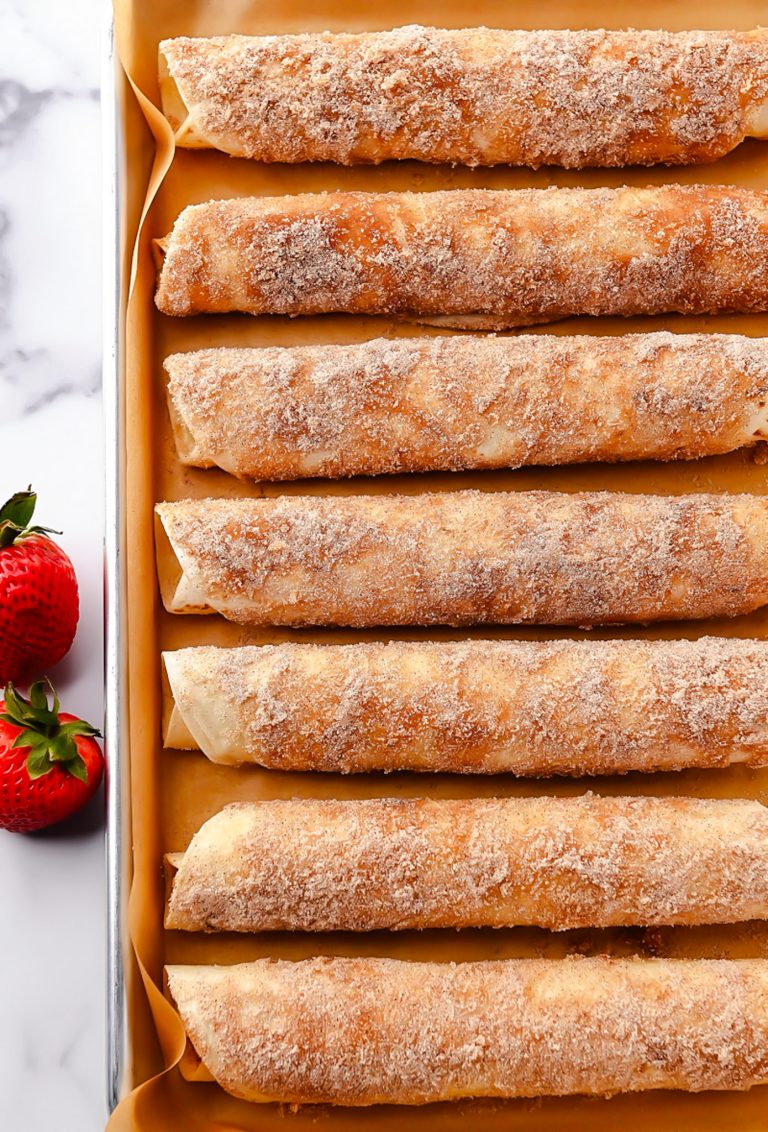 Cheesecake Taquitos have a silky-smooth cheesecake filling wrapped inside a crispy flour tortilla that's been rolled in cinnamon and sugar. Life-in-the-Lofthouse.com