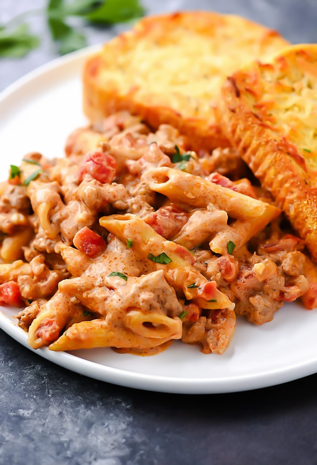 Creamy Tex-Mex pasta with ground beef, Rotel tomatoes, and melted cheese.