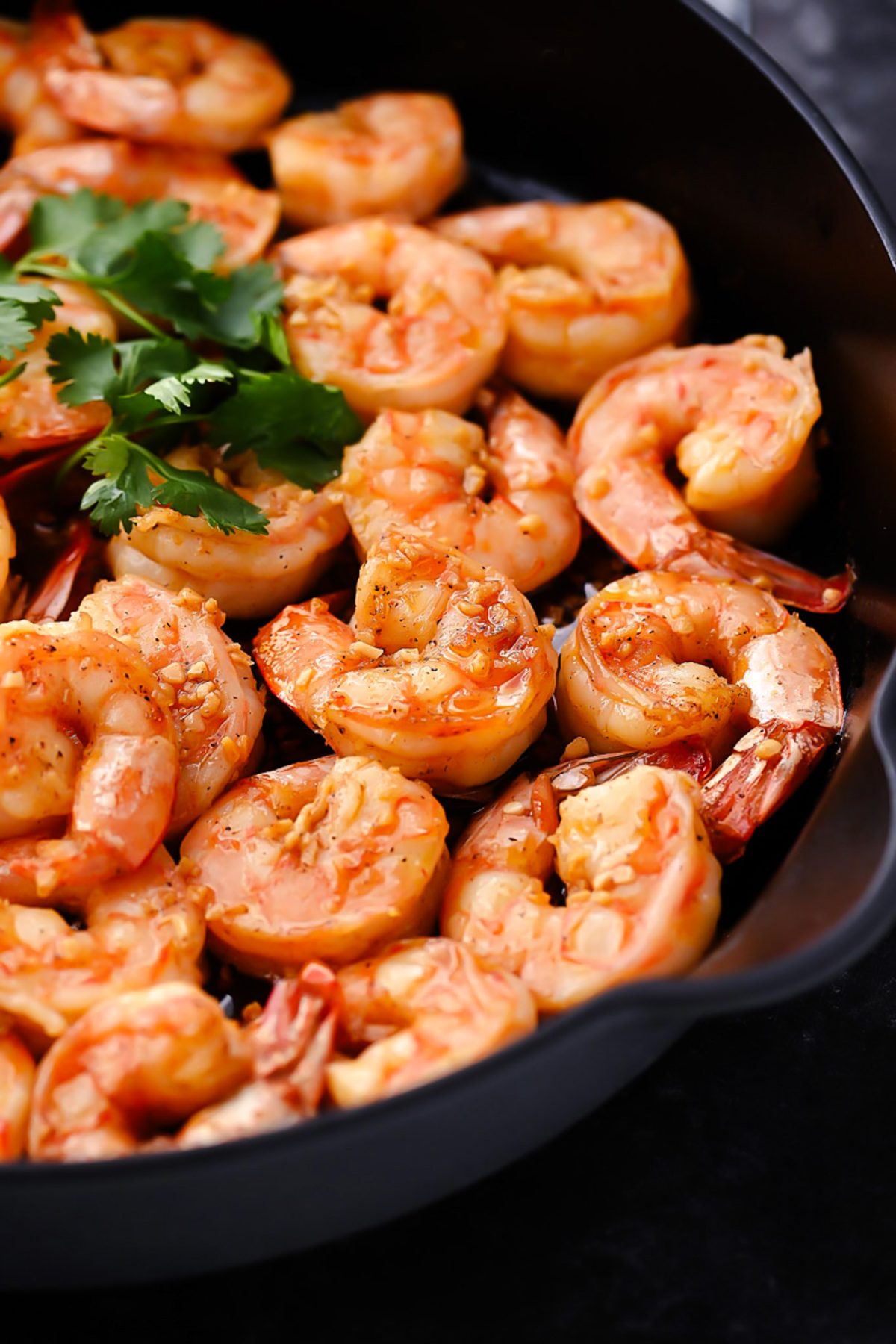 Hawaiian-style garlic shrimp: juicy, seasoned shrimp sizzling to perfection, inspired by the North Shore, offering a flavorful taste of the islands.