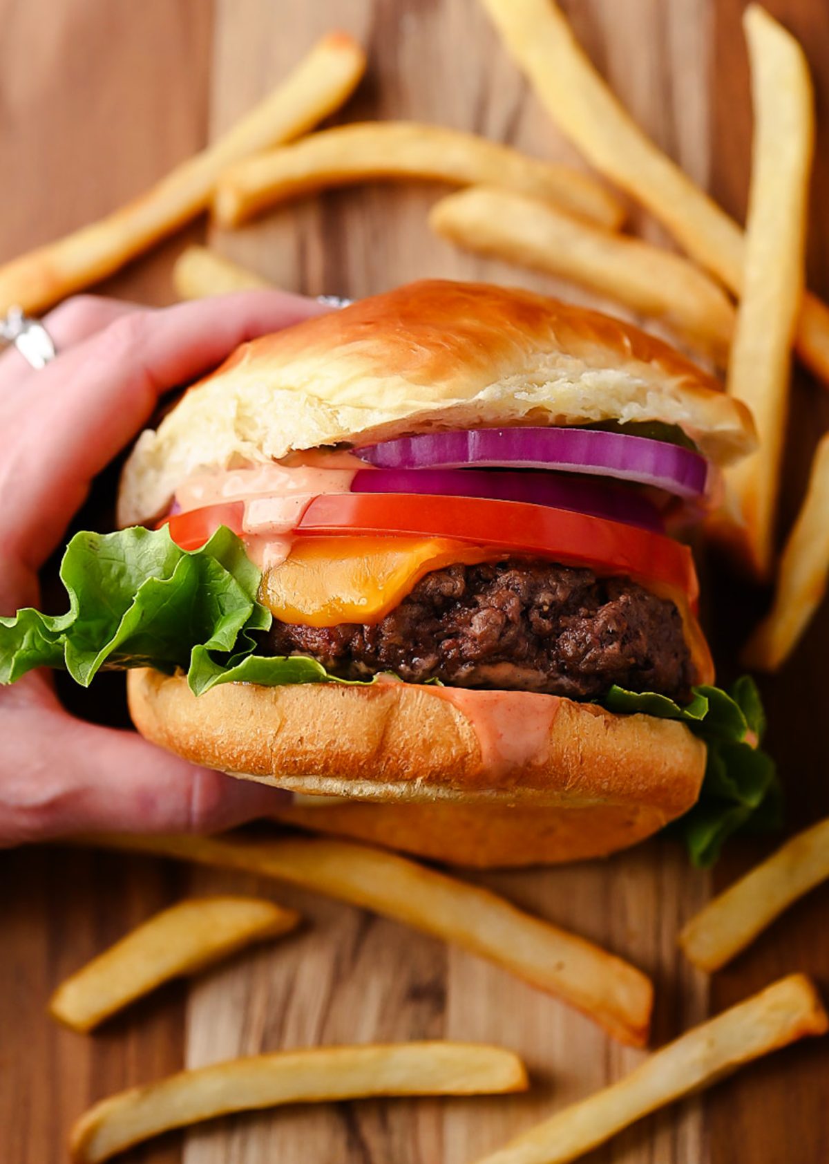 The Best Ever Cheeseburgers are juicy, cheesy, and packed with flavor.