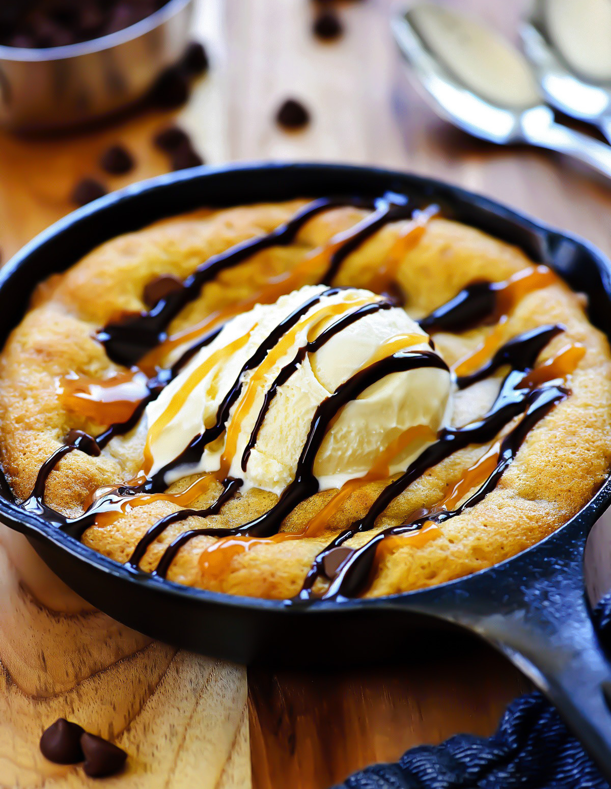 Chocolate chip skillet cookie is a warm, gooey chocolate chip cookie baked in a mini skillet. Life-in-the-Lofthouse.com