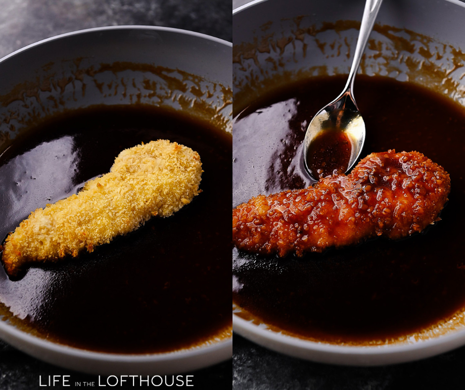Crispy Chicken Tenders being dunked in the honey butter sauce
