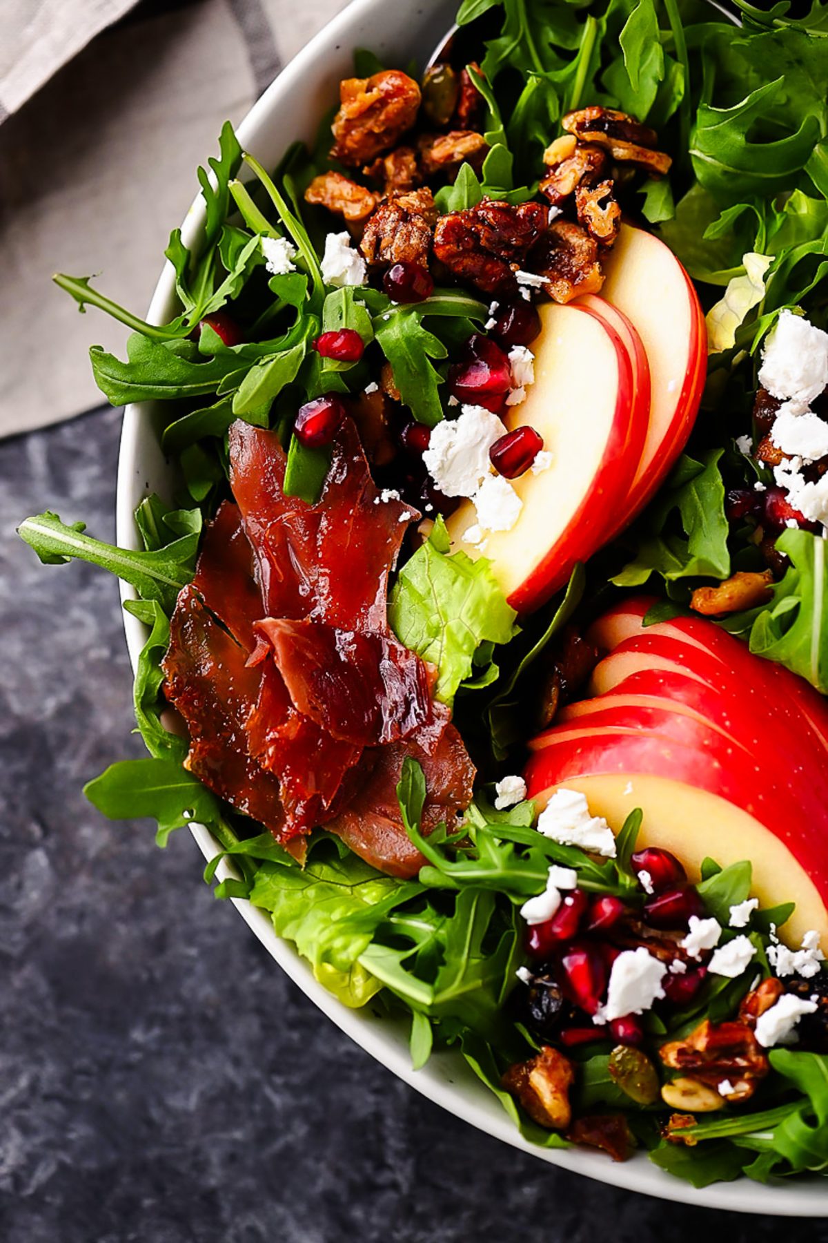 Honeycrisp Apple, Prosciutto, and Feta Salad combines crisp apples, salty prosciutto, creamy feta, and a tangy apple cider vinaigrette.