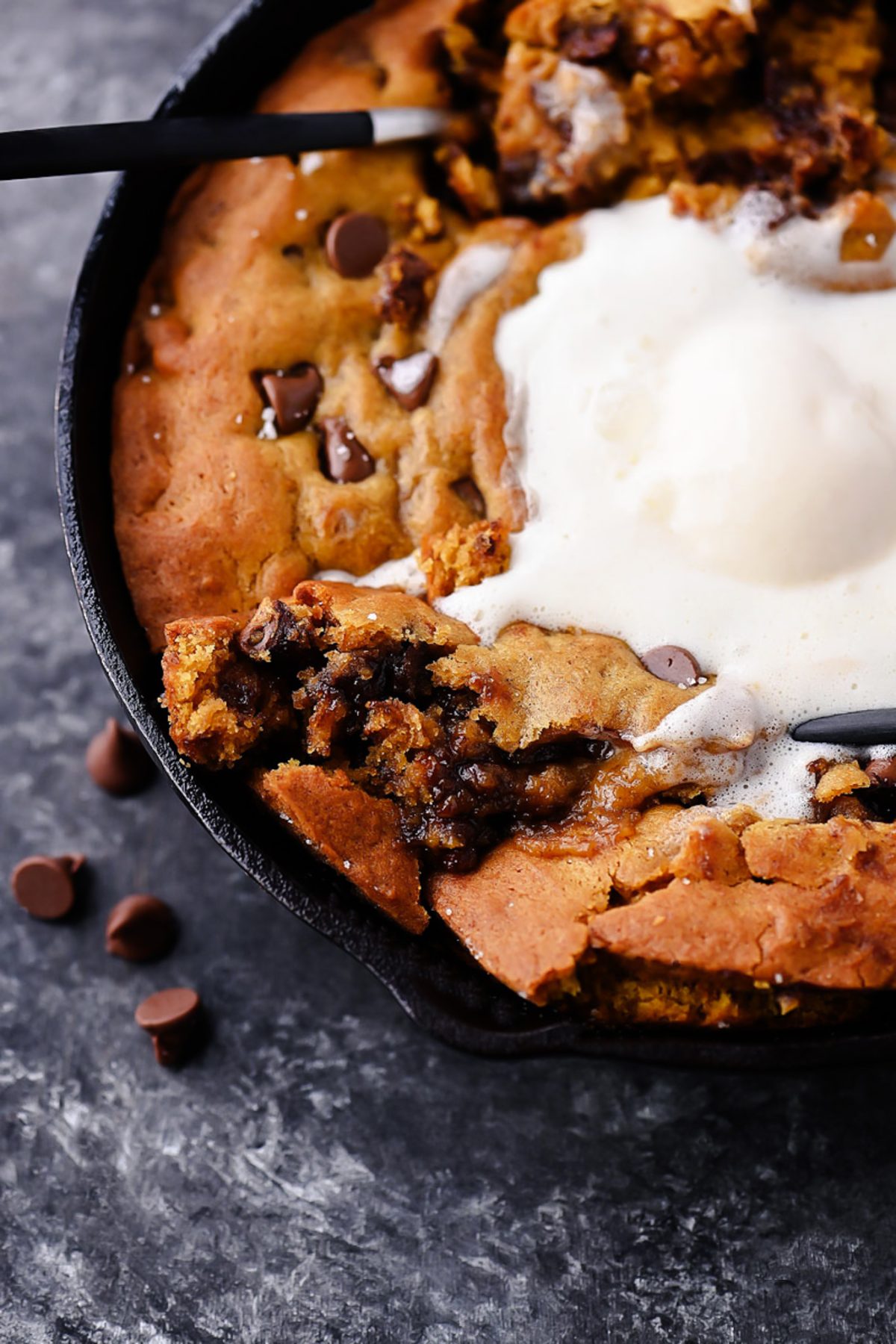 Warm and Gooey Pumpkin Chocolate Chip Cookie Skillet with Vanilla Ice Cream