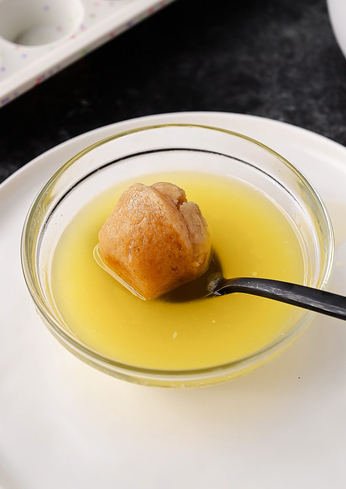Mini Baked Cinnamon Sugar Donuts Dunked in butter